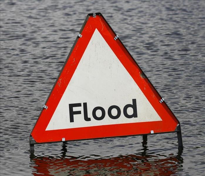  A sign that says flood